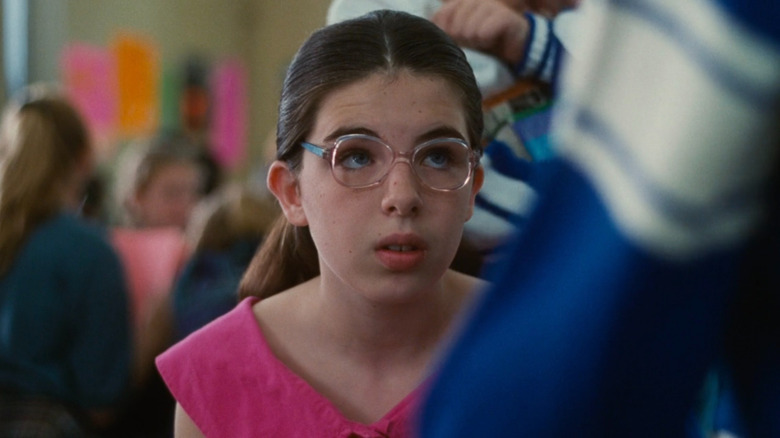 Dawn Wiener looking up at cheerleaders in "Welcome to the Dollhouse"