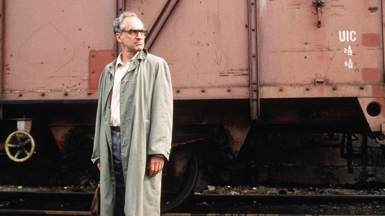 Andrei standing in a rail yard in "Citizen X"