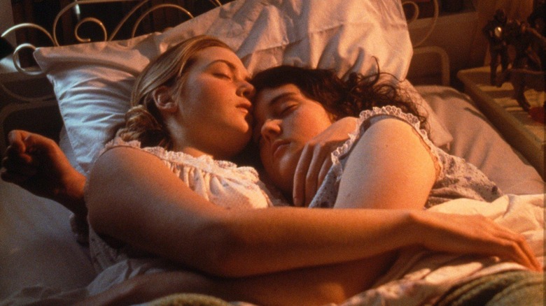 Juliet and Pauline asleep on bed together in "Heavenly Creatures"