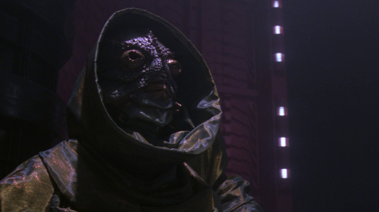 An alien lizard in a cloak in Star Trek: The Next Generation