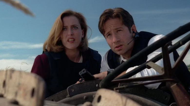 Scully and Mulder looking horrified at something on The X-Files