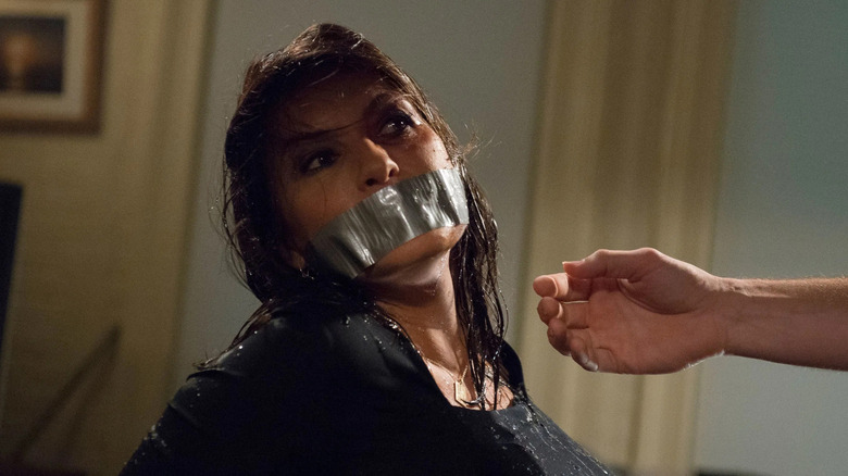 Olivia with tape on her mouth as a kidnap victim in Law & Order Special Victims Unit