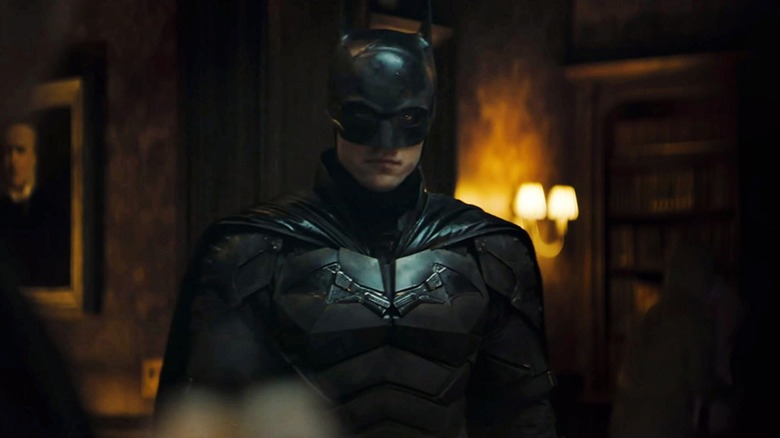 Batman standing at a crime scene in "The Batman"