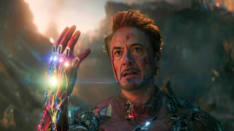 An unmasked Iron Man with the Infinity Stones in "Avengers: Endgame"
