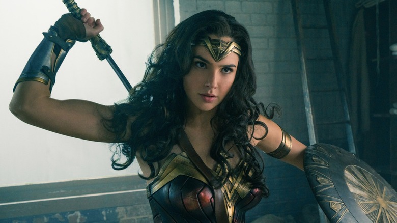Wonder Woman wielding a shield and sword in "Wonder Woman"
