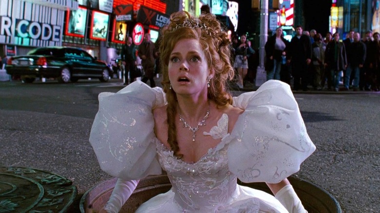 Giselle looking concerned standing in a NYC manhole in Enchanted