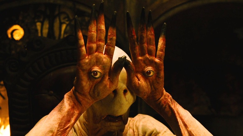The Pale Man watching through the eyes on his hands in Pan's Labyrinth