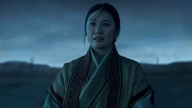 Jin standing on a VR simulation of an alien planet in "3 Body Problem" (2024)