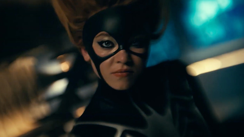 Julia Cornwall as Spider-Woman hanging upside down in "Madame Web"