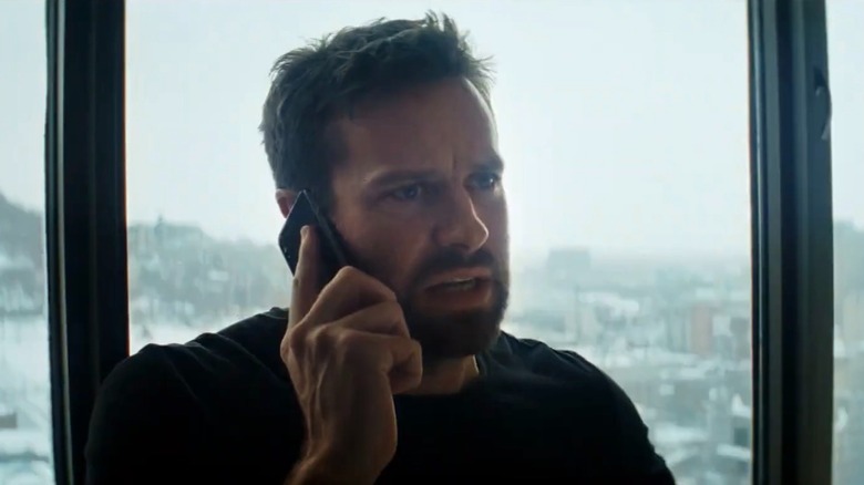 Armie Hammer as DEA Agent Jake Kelly, on the phone angrily in Crisis