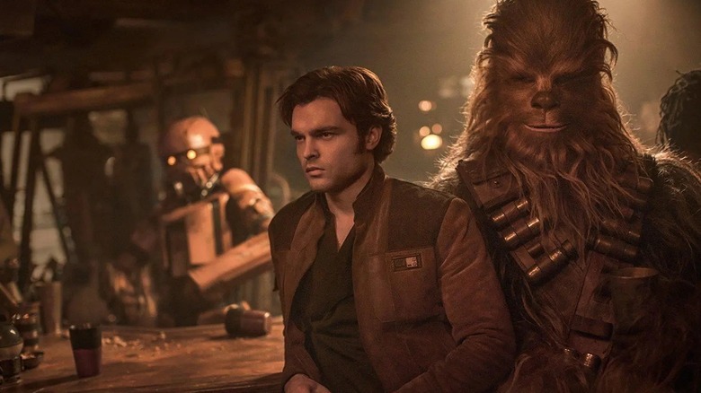 Han Solo and Chewbacca in a bar in Solo: A Star Wars Story (2018)