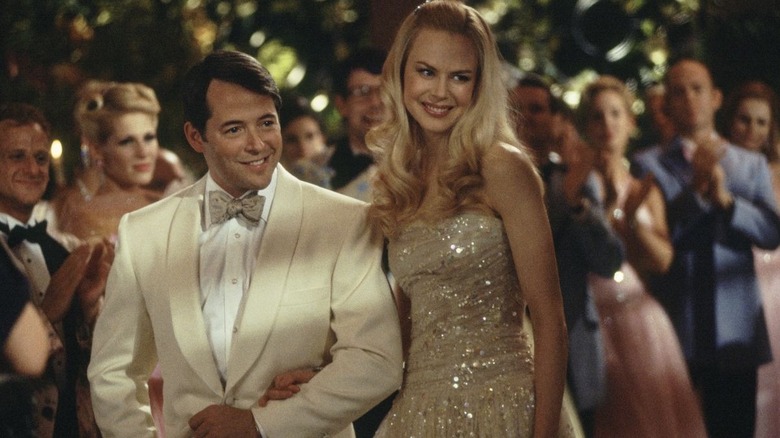 Joanna Eberhart and Walter Kresby attend a party in "The Stepford Wives" (2004)