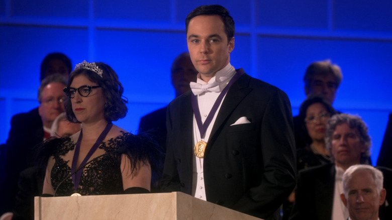 Sheldon standing at a podium in "The Big Bang Theory."