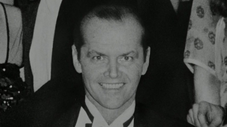 Jack Torrance grinning in the Overlook hotel photo (1979)
