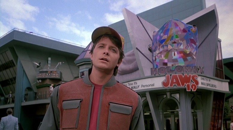 Marty McFly standing outside of the theater complex in Back to the Future Part II