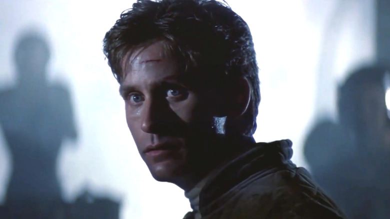 Alex Furlong looking over his shoulder in Freejack