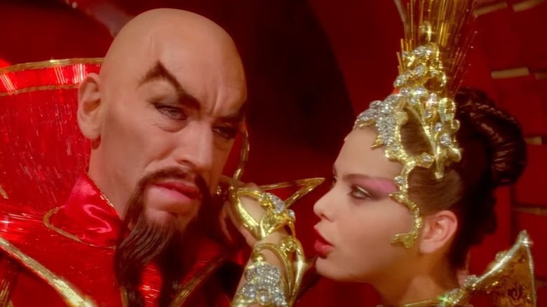 Princess Aura talks to Ming the Merciless in Flash Gordon (1980)