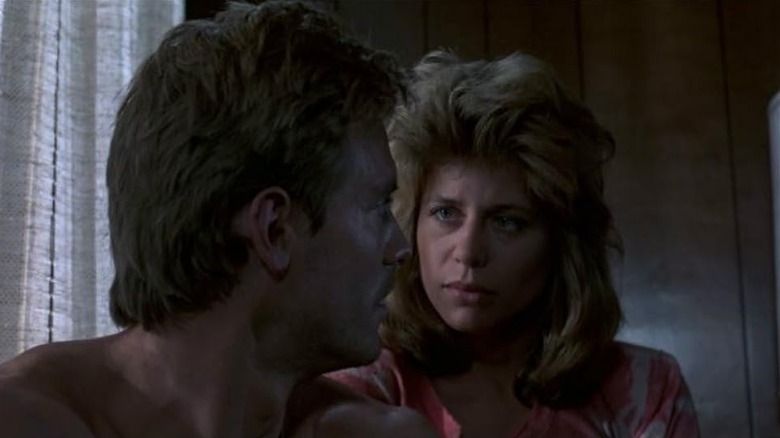 Kyle looks back at Sarah in The Terminator (1984)