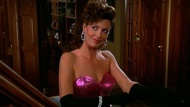Lisa in a pink dress smiling in Weird Science (1985)