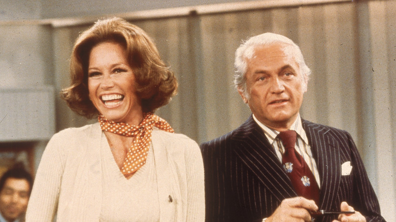 Mary Tyler Moore and Ted Knight laugh in a still from "The Mary Tyler Moore Show"