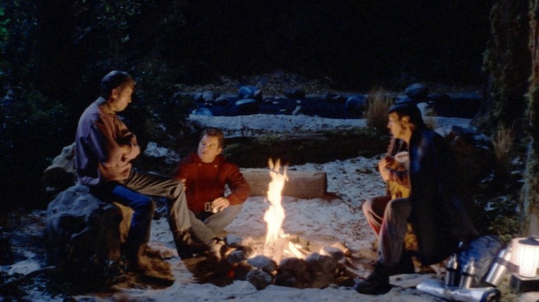 Kirk, Spock, and McCoy around a campfire in Star Trek V: The Final Frontier