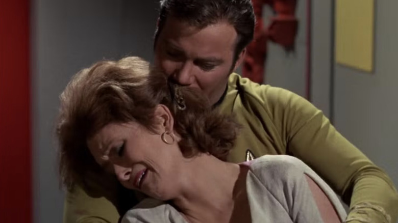 Kirk holds a crying Janice Lester in his arms in Star Trek
