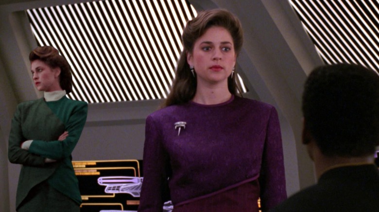 Leah Brahms and her hologram standing before Geordi on Star Trek The Next Generation (1987 - 1994)