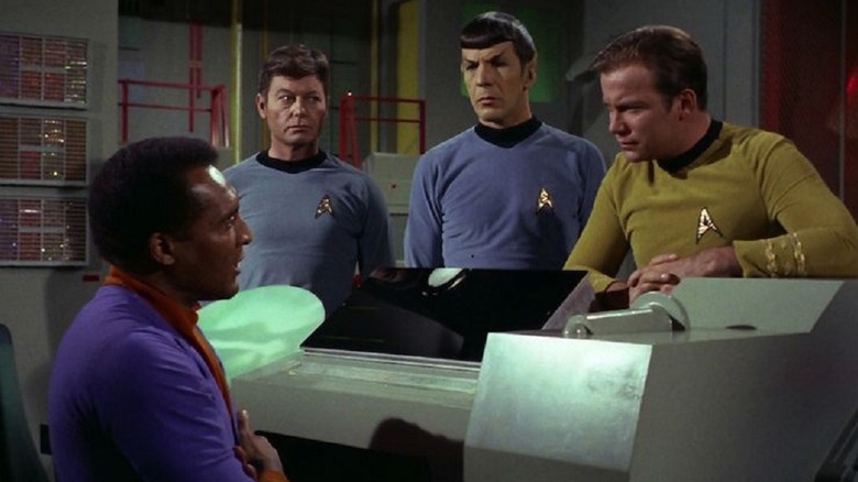 Kirk, Spock, and McCoy confront Daystrom in the engine room in Star Trek