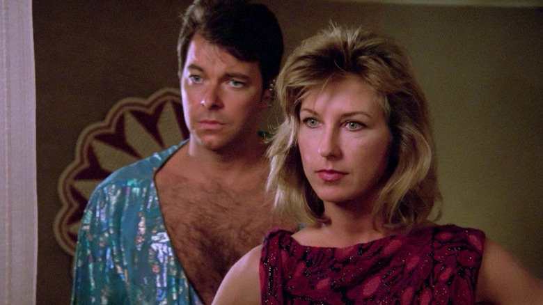 Riker and Beata stand calmly in Star Trek: The Next Generation