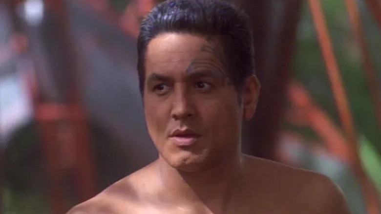 Chakotay shirtless in the woods in Star Trek: Voyager