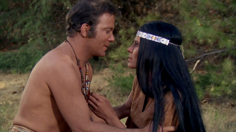 Kirk grabs Miramanee in Star Trek