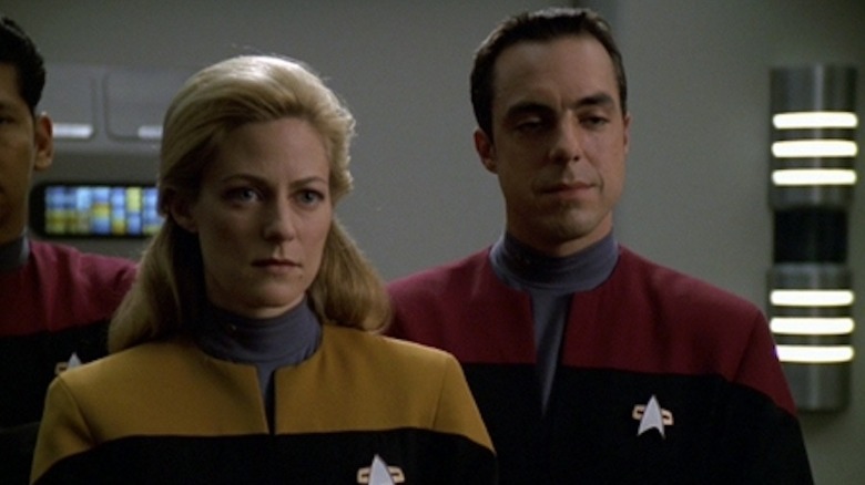 Gilmore and Burke stand in side by side in Star Trek: Voyager