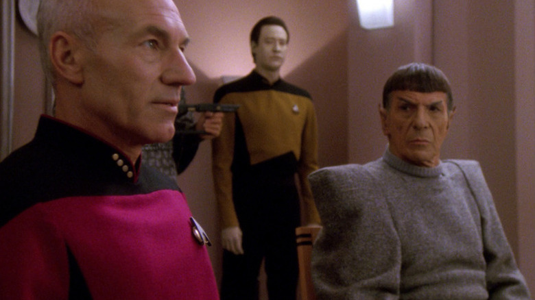 Picard, Spock, and Data in a room on Romulus in Star Trek: The Next Generation