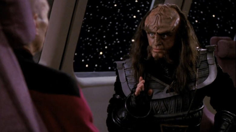 Gowron tries to convince Picard in the conference room in Star Trek: The Next Generation