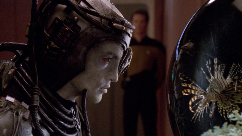 Hugh examines Livingston in Star Trek: The Next Generation