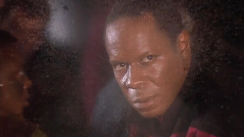 Sisko looks out a window in Star Trek: Deep Space Nine