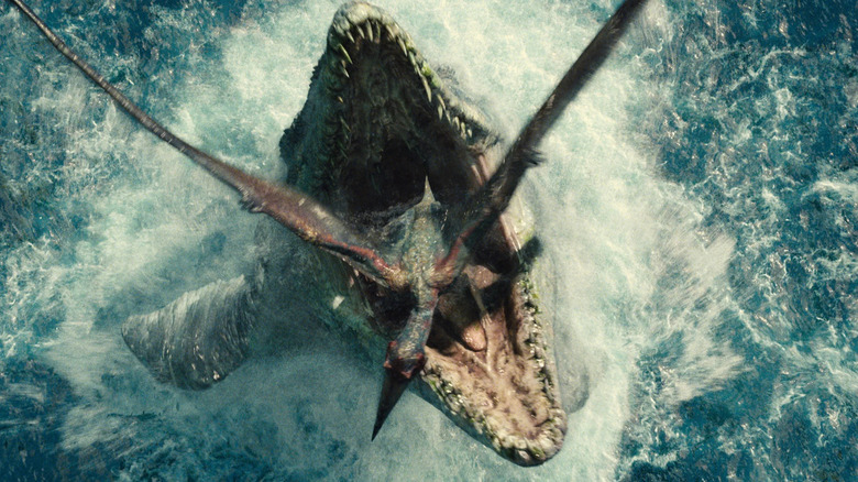 The Mosasaurus leaps out of the water and it devours a fluttering pterodactyl in "Jurassic World"