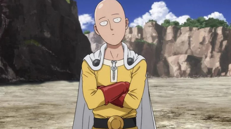 Saitama folding his arms and looking surprised