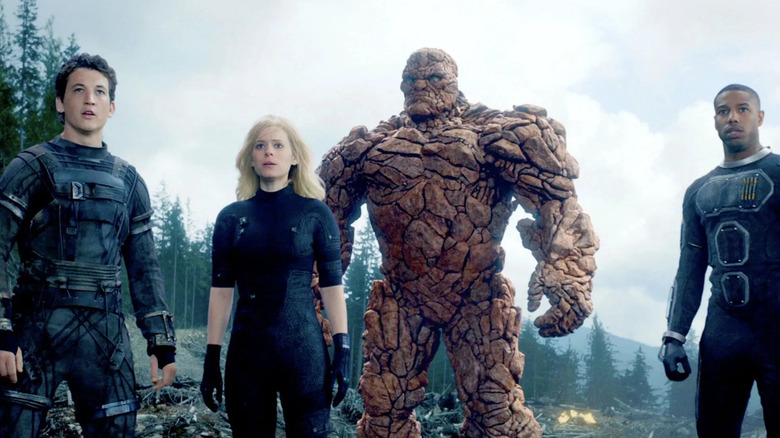 Reed Richards, Sue Storm, The Thing, and Johnny Storm standing together in Fantastic Four