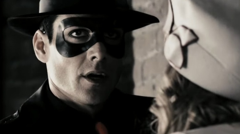 The Spirit talking to a woman in The Spirit