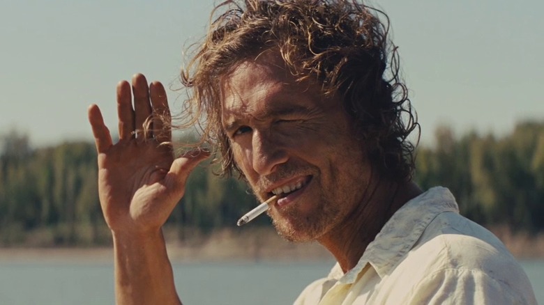 Matthew McConaughey waving, cigarette in mouth