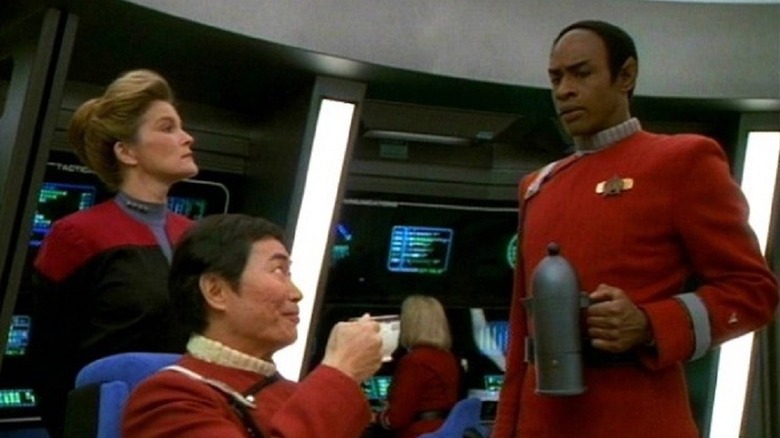 Tuvok serves Sulu tea on the bridge in Star Trek: Voyager