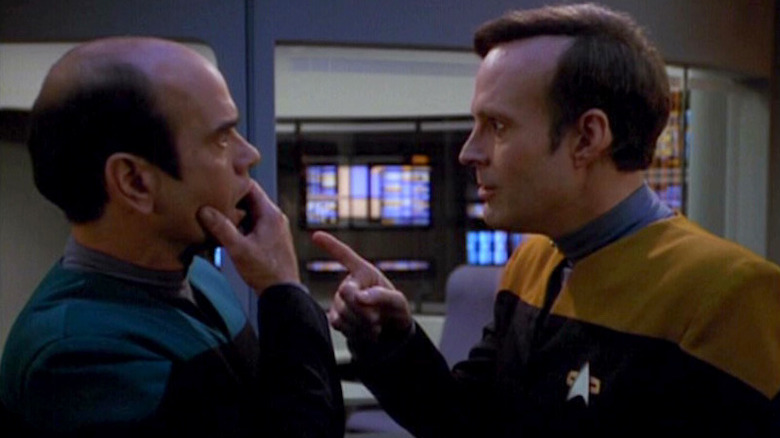 The Doctor points finger at Barclay in sickbay in Star Trek: Voyager
