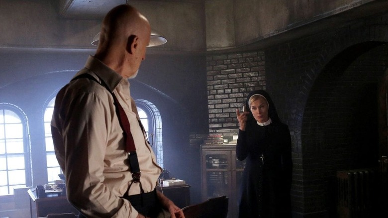 Dr. Arden talking to Sister Jude in American Horror Story: Asylum
