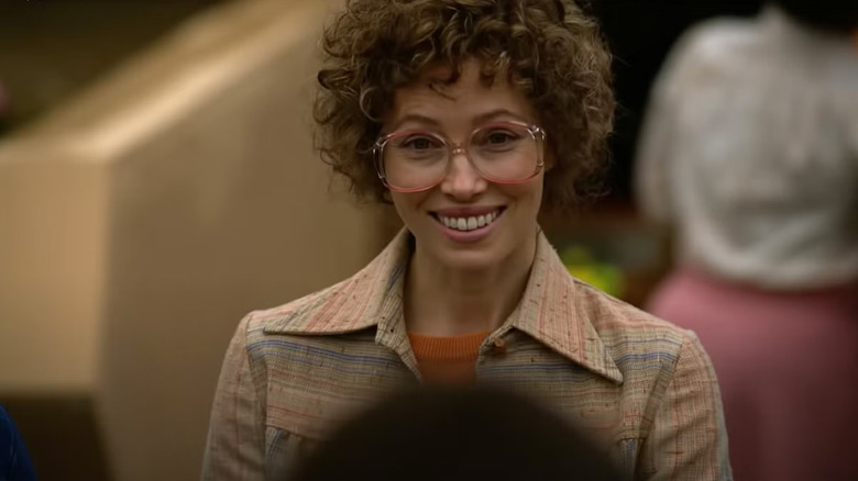 Candy Montgomery wearing huge glasses and smiling in Candy