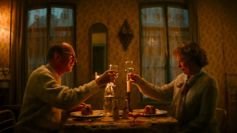 Christopher and Susan toasting in Landscapers
