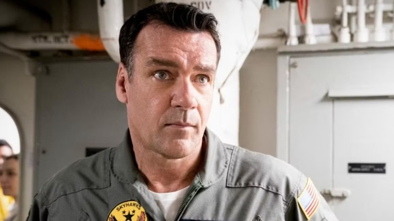 Harmon frowning in "JAG."