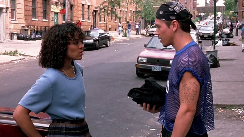 Chino and Lisette talking in the street in I Like It Like That (1994)