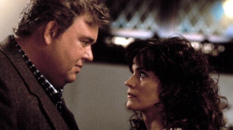 Danny and Theresa looking into each others' eyes in Only the Lonely (1991)