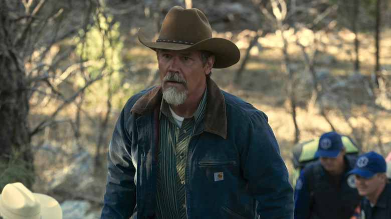 Royal Abbott walking up the hill in Outer Range